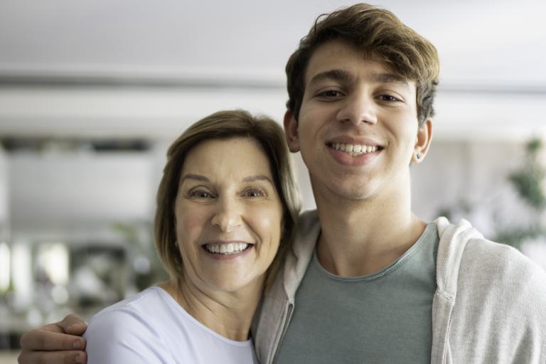 Carer with refugee teen