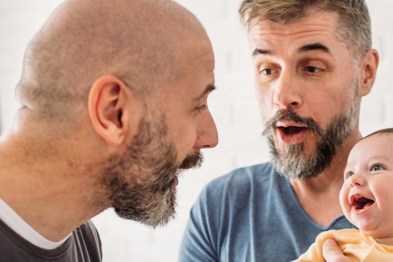 male couple with baby