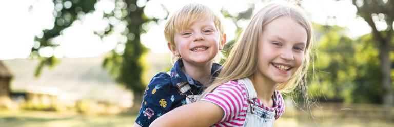 Brother & sister piggyback